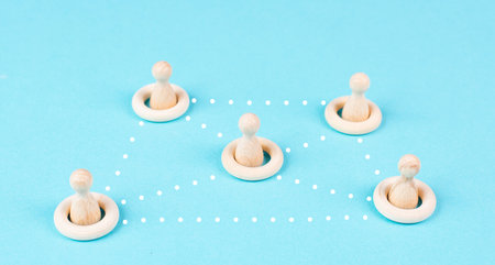 Group of people connecting through a web, business networking, communication and teamworkの写真素材