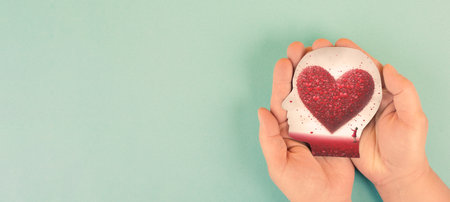 Brain with heart, love and passion, self esteem and mental health care concept, positive thinking, creative mind, generative AI for heartの素材