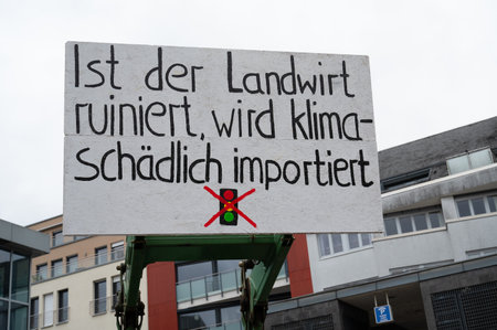 Farmer protest, denounce government plan for abolishing agricultural diesel and vehicle tax exemptions, demonstration with tractors in the city of Trier, Germany on the 8.1.2024のeditorial素材