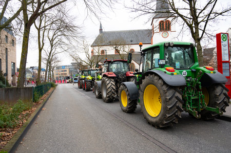 Farmer protest, denounce government plan for abolishing agricultural diesel and vehicle tax exemptions, demonstration with tractors in the city of Trier, Germany on the 8.1.2024のeditorial素材