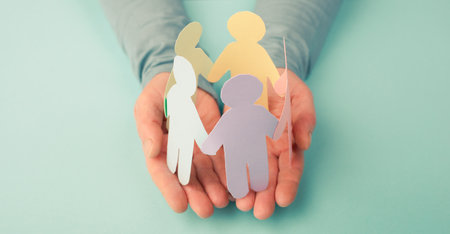 Human rights, friendship support and freedom, multicultural people holding hands, humanitarian help, no discrimination and racismの写真素材