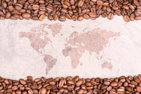 Roasted arabica beans with world map, international coffee day, hot caffeine drink for breakfast, take a breakの写真素材