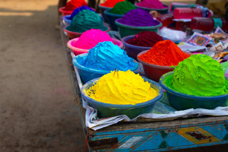 Holi festival India, market stall with colorful powder, celebrating the Hindu holiday of colors, love, equality and springの写真素材