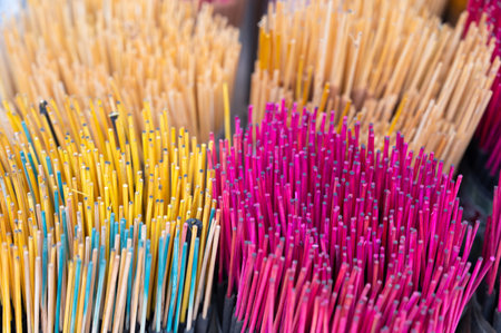 Colorful incense sticks on a market stall in India, agarbatti used for religious rituals in Asia, workship of Hinduism, Buddhism and Jainismの写真素材