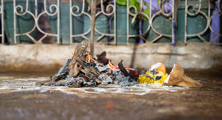 Holika Dahan, ritual bonfire and painting with colors on the evening before the holi festival in...
