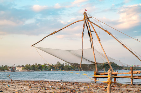 Chinese fishing nets on the shore of Kochi, Kerala in India, Cheenavala or tangkul, traditional stationary lift netの写真素材