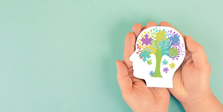 ADHD, attention deficit hyperactivity disorder, mental health, head of child, colorful jigsaw or puzzle pieces, cognitive difficultyの写真素材