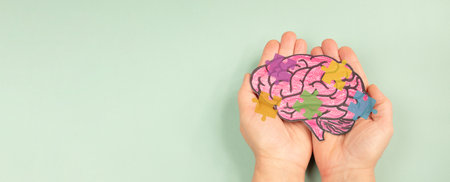 ADHD, attention deficit hyperactivity disorder, mental health, brain with cognitive difficulty, colorful puzzle piecesの写真素材