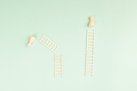 Success and failure concept, winner and loser, progress, goal, strategy and comparison in society, climbing up the ladder, opportunity, development and growthの写真素材