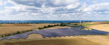 Solar panel station, wind turbine park, agriculture field with windmills, renewable sustainable...