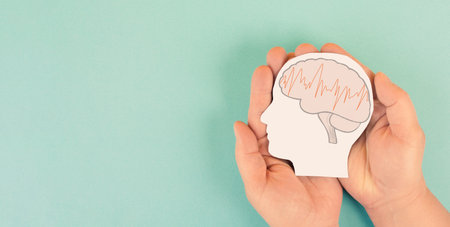 Epilepsy migraine headache seizure attack, mind with EEG wave, alzheimer or tumor in brain, neurological diseaseの写真素材