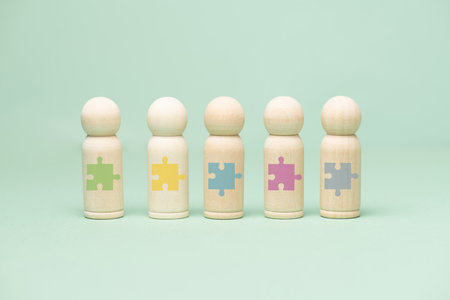 Teamwork concept, goal, plan and strategy for success, team communication and cooperating, putting the puzzle parts togetherの写真素材