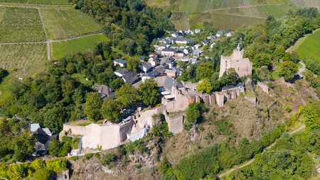 Saarburg castle, banks of river Saar, cityscape surrounded by vineyard hills, Rhineland Palatinate, Germanyの写真素材