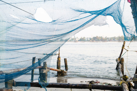Chinese fishing nets, shore of Kochi, Kerala in India, Cheenavala or tangkul, traditional stationary...