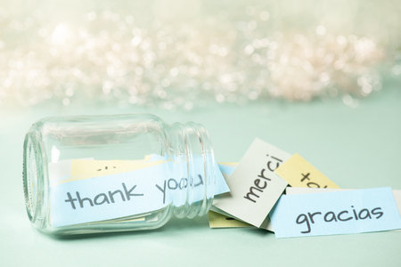 Thank you, word thanks in different languages, being grateful, support, help and charity, global communication, jar with notesの写真素材