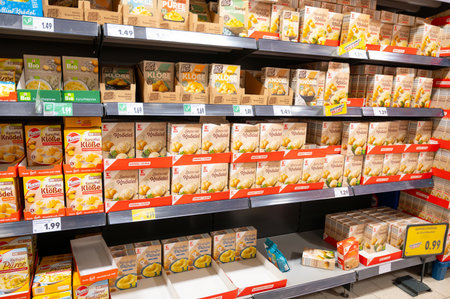 Bread dumplings and mashed potatoes convenience foods packages standing on a supermarket shelf, grocery assortment, Trier, Germany, November 17th 2025のeditorial素材