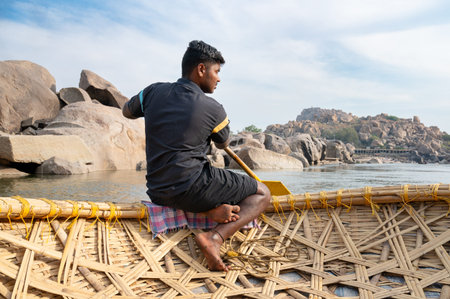 Coracle boats at the Tungabhadra River in Hampi, India, traditional round fishing basket boat made from cane, leather and bitumen, March 7th 2025のeditorial素材