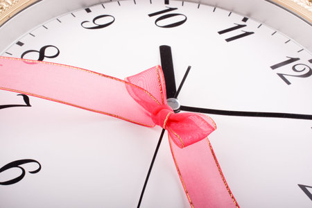 clock with ribbon in it