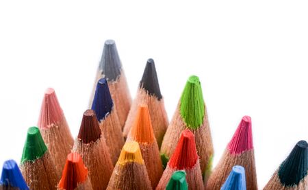 Colour pencils of various colors on white backgroundの写真素材