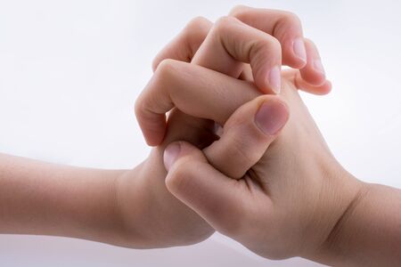 Hands clutch one anotherの写真素材