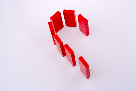 Half heart made of red dominoesの写真素材