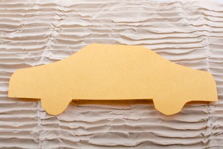 Car shape cut out of paperの写真素材