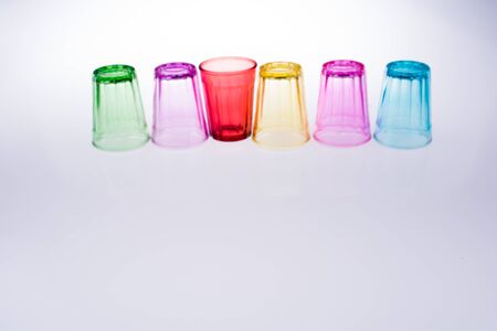 Colorful drinking glass on white backgroundの写真素材