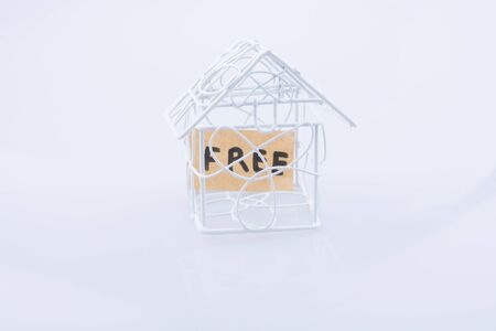 The word HELP and a model houseの写真素材