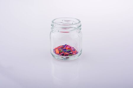 Little perfume glass bottle on a white backgroundの写真素材