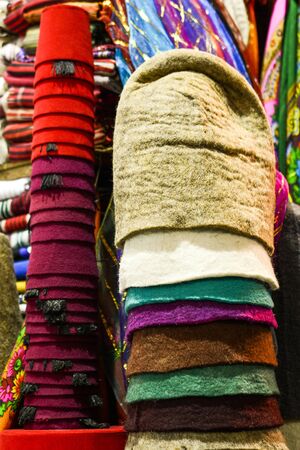 Pile of Turkish fez, traditional ottoman hatの写真素材