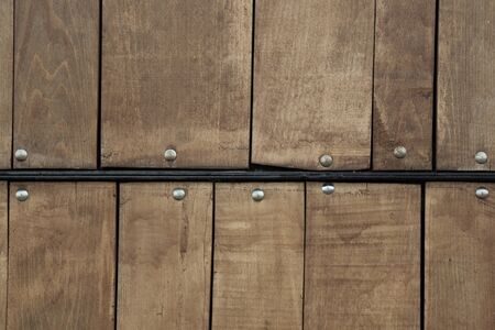 Old  planks of wood as wooden background textureの写真素材