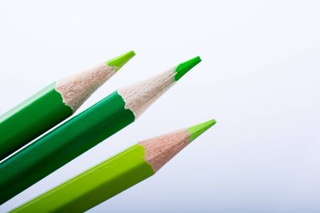 Color Pencils of various colors on a  white backgroundの写真素材