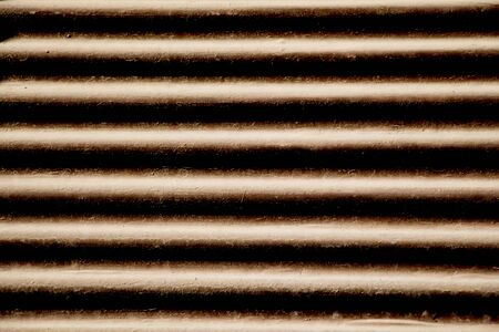 Straight lines on a shop front shutter as a metal backgroundの写真素材