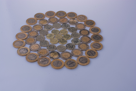 Turkish Lira coins together shape a  round circle form on white backgroundの写真素材