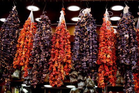 Bundles of red vegetables dry in the sunの写真素材