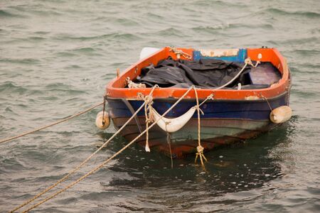 Fishing boat in the waters of the seaの写真素材