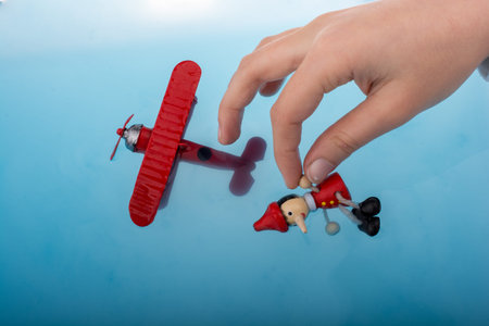 Pinocchio and a model airplane in water