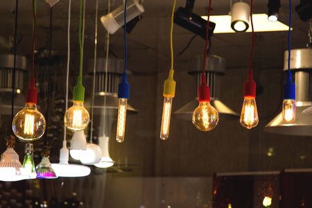 Decorative antique edison style filament light bulbs hangingの写真素材