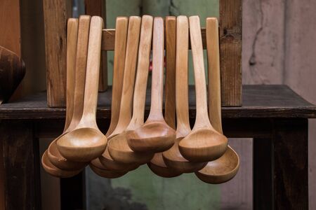 dozens of soup spoon or tablespoon made of woodの写真素材