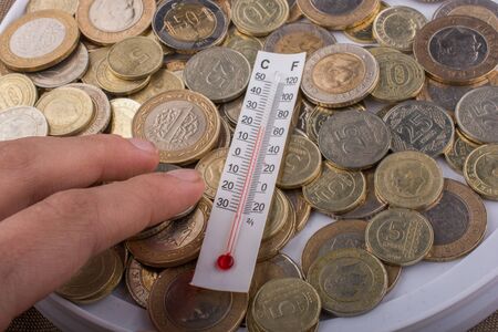 Thermometer  instrument and Turkish Lira coinsの写真素材