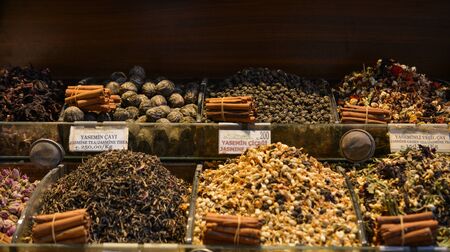 Various dry plants as herbal tea at the market for saleの写真素材