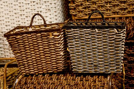 Empty wicker baskets are for sale in a market placeの写真素材