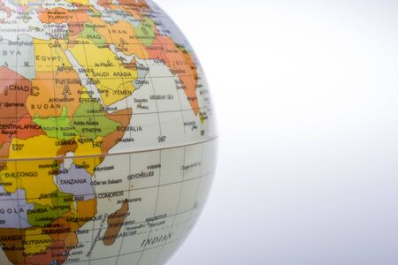 Little colorful model globe with maps on itの写真素材