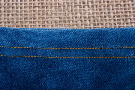 Denim canvas placed on  linen canvas as  a background