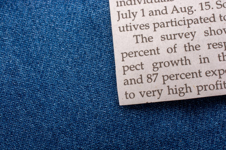 Texted paper placed  on a denim canvas