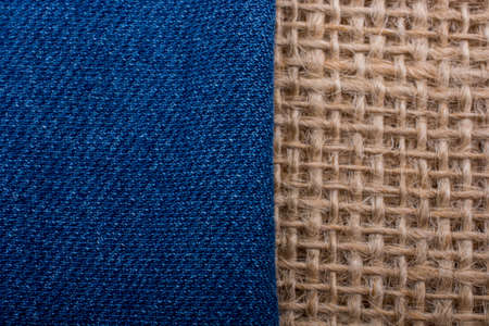 Denim canvas placed on  linen canvas as  a backgroundの写真素材