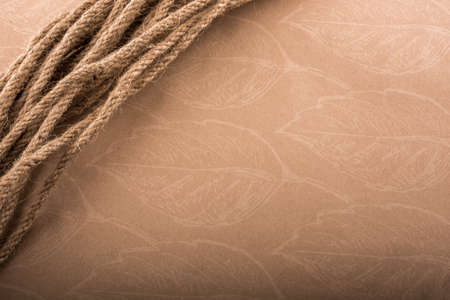 Bundle of linen rope  in a sbrown backgroundの写真素材