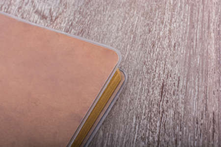Spiral notebook placed on a grey backgroundの写真素材