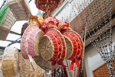 Empty wicker baskets are for sale in a market placeの写真素材