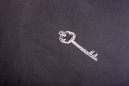 Retro styled golden color key forms the word keyの写真素材